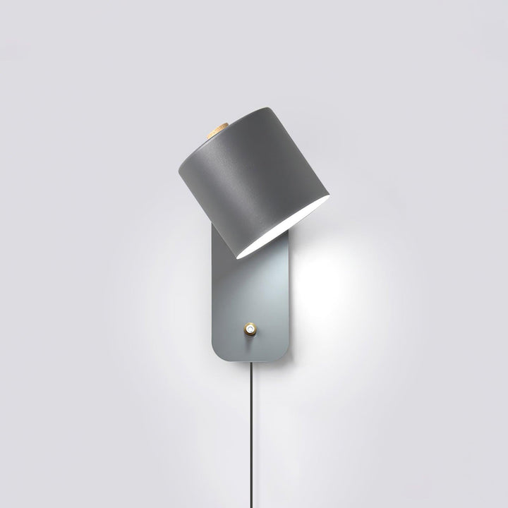 Obrotowa lampa ścienna z cylindrycznym kloszem