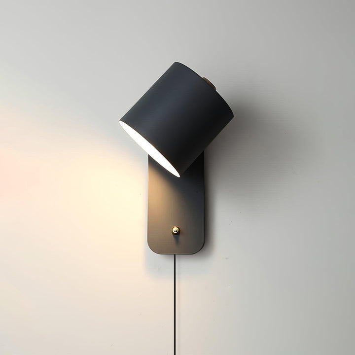 Obrotowa lampa ścienna z cylindrycznym kloszem