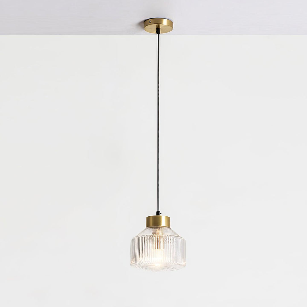 Lampa wisząca w kształcie wirującego bączka w paski