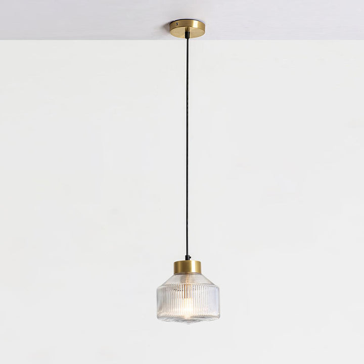 Lampa wisząca w kształcie wirującego bączka w paski