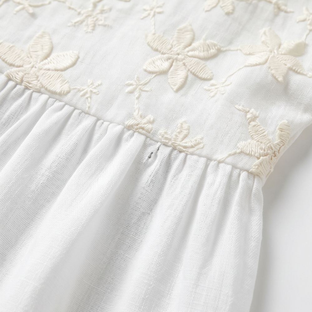 Floralé – Kobieca Bluzka z Haftowanymi Kwiatami w Stylu Peplum