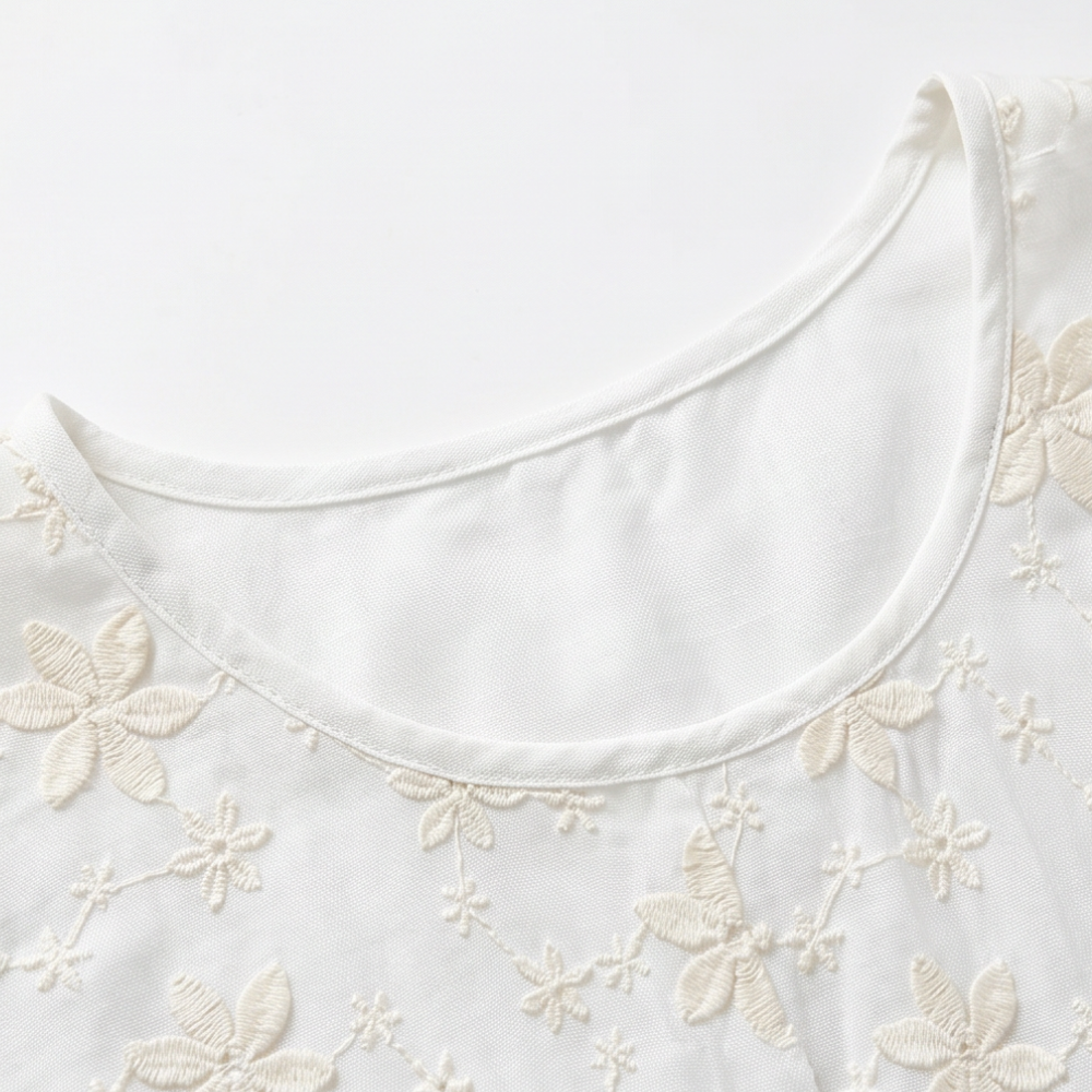 Floralé – Kobieca Bluzka z Haftowanymi Kwiatami w Stylu Peplum
