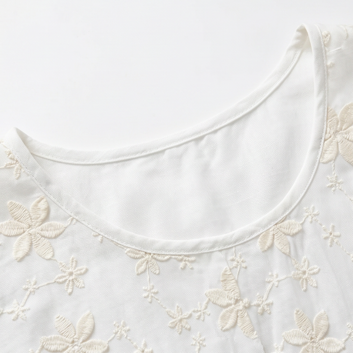 Floralé – Kobieca Bluzka z Haftowanymi Kwiatami w Stylu Peplum