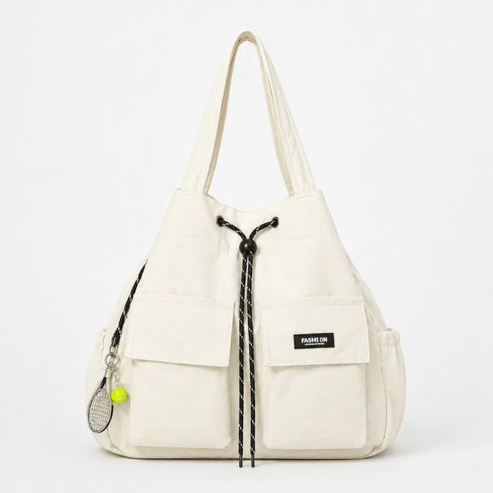 Torba Carryall – Konwertowalna torba z troczkami i plecak z kieszeniami cargo