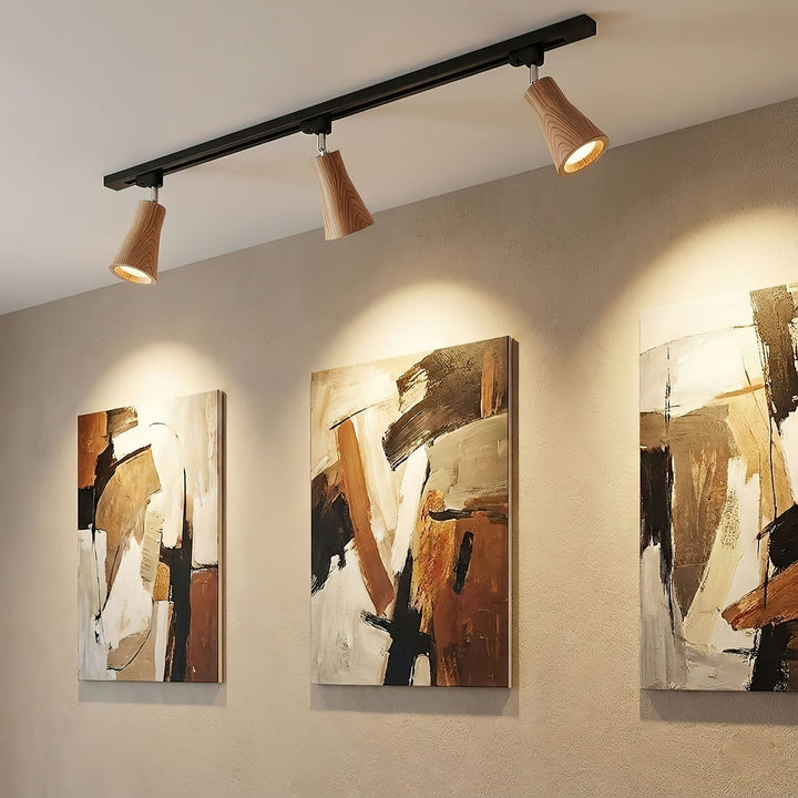 Lampa sufitowa na drewnianym torze