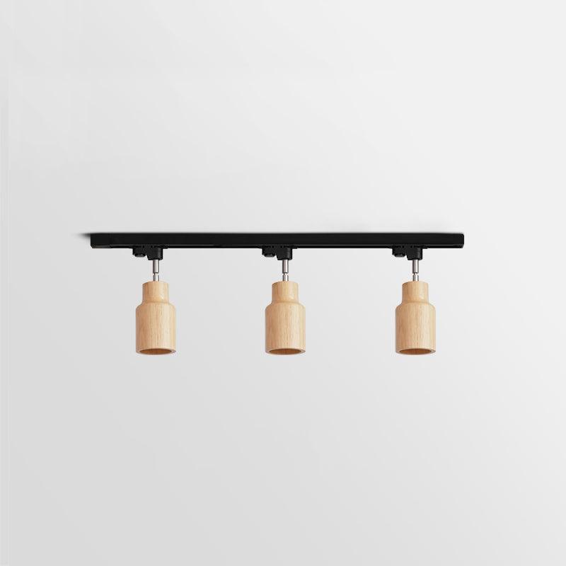 Lampa sufitowa na drewnianym torze