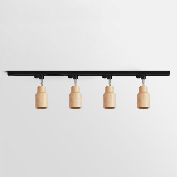 Lampa sufitowa na drewnianym torze