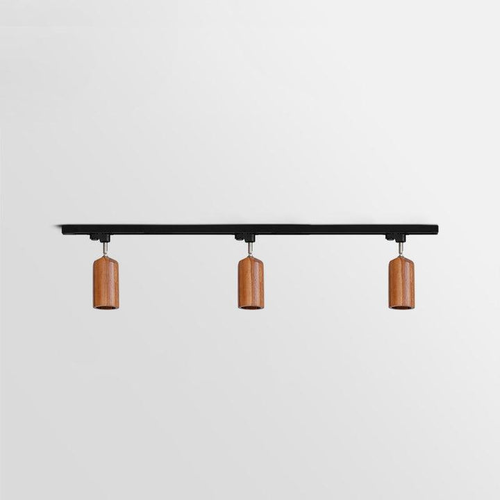 Lampa sufitowa na drewnianym torze