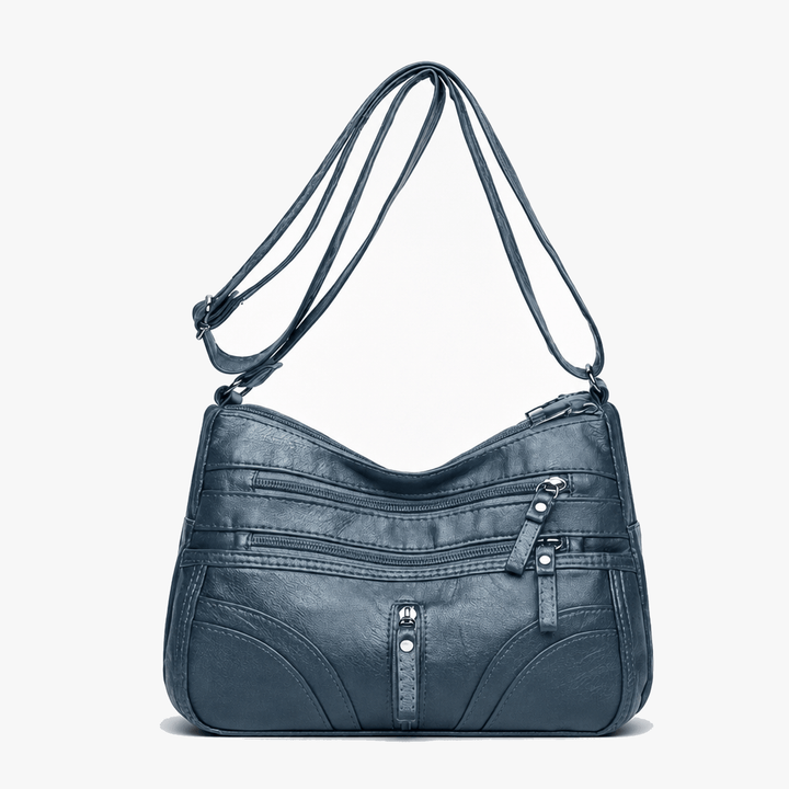 Caressa – Miękka skórzana torebka crossbody z wieloma kieszeniami
