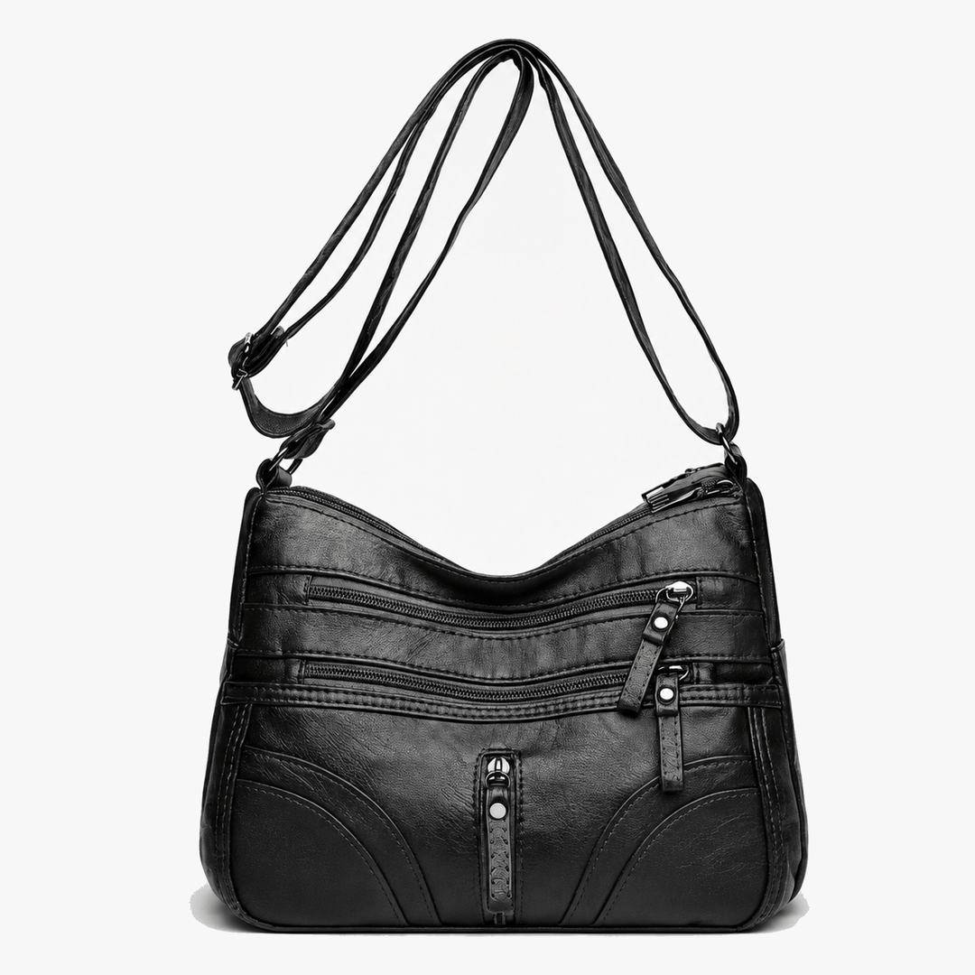Caressa – Miękka skórzana torebka crossbody z wieloma kieszeniami