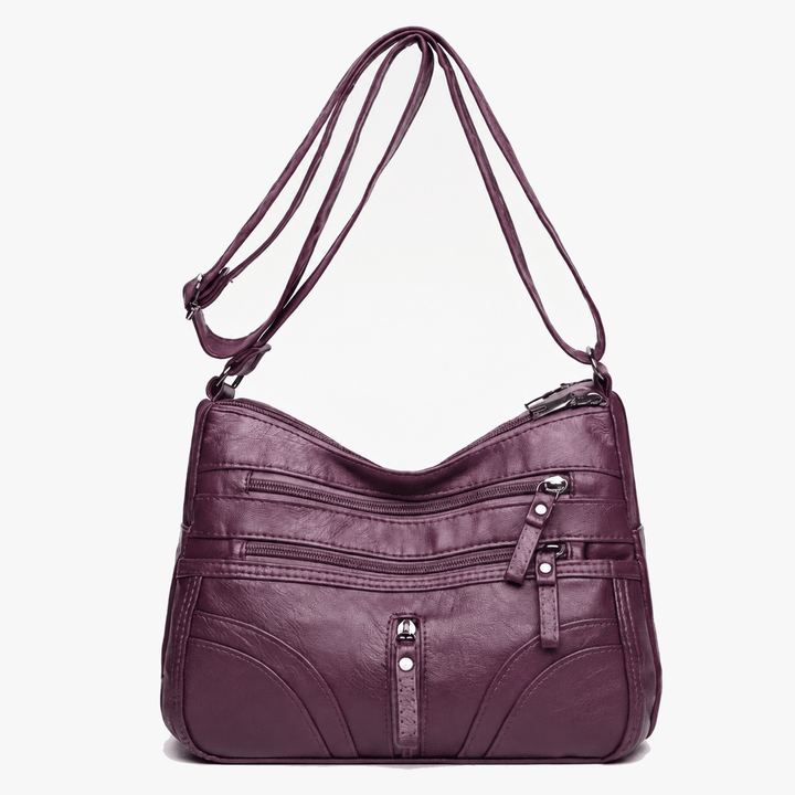Caressa – Miękka skórzana torebka crossbody z wieloma kieszeniami