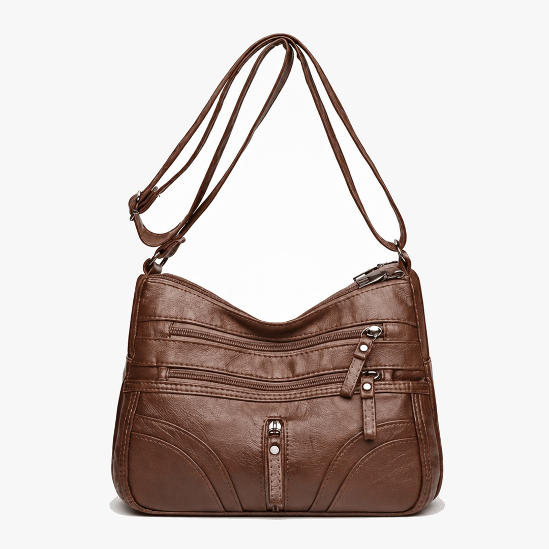 Caressa – Miękka skórzana torebka crossbody z wieloma kieszeniami