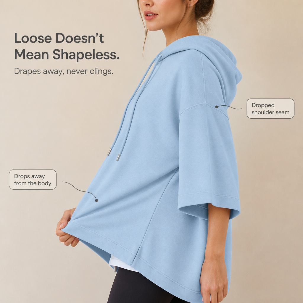 Wearlyn – Oversized Ponczo z Kapturem i Krótkim Rękawem
