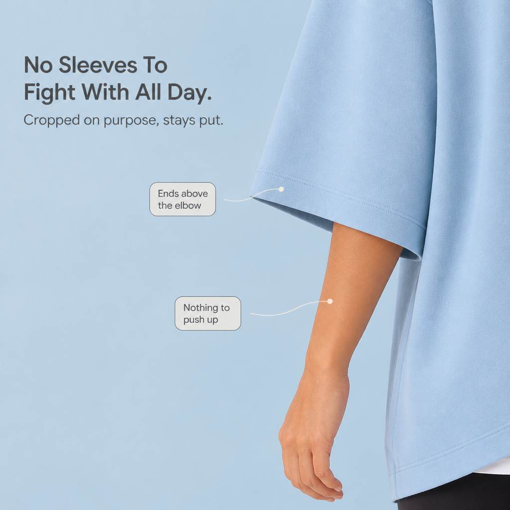 Wearlyn – Oversized Ponczo z Kapturem i Krótkim Rękawem