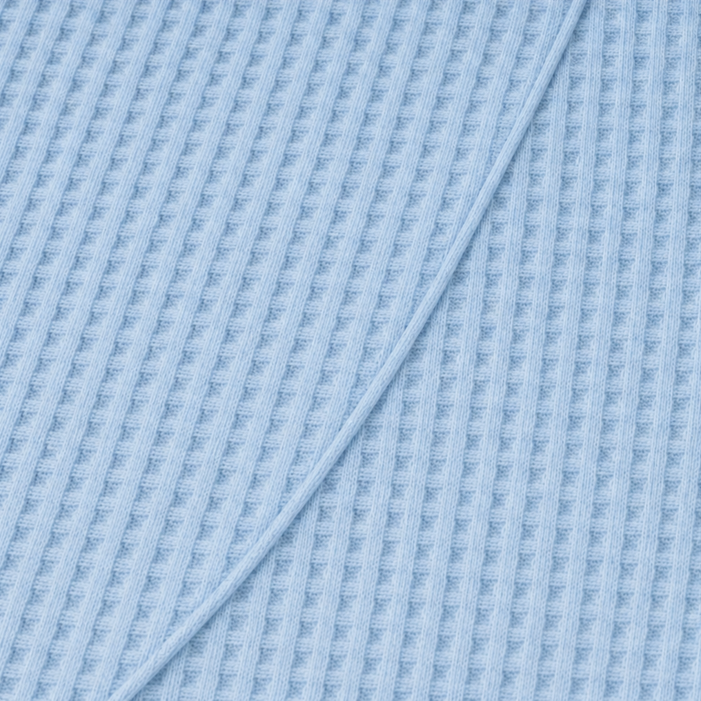Draperly – Bluzka z asymetrycznym dołem w wyglądzie dzianiny waflowej