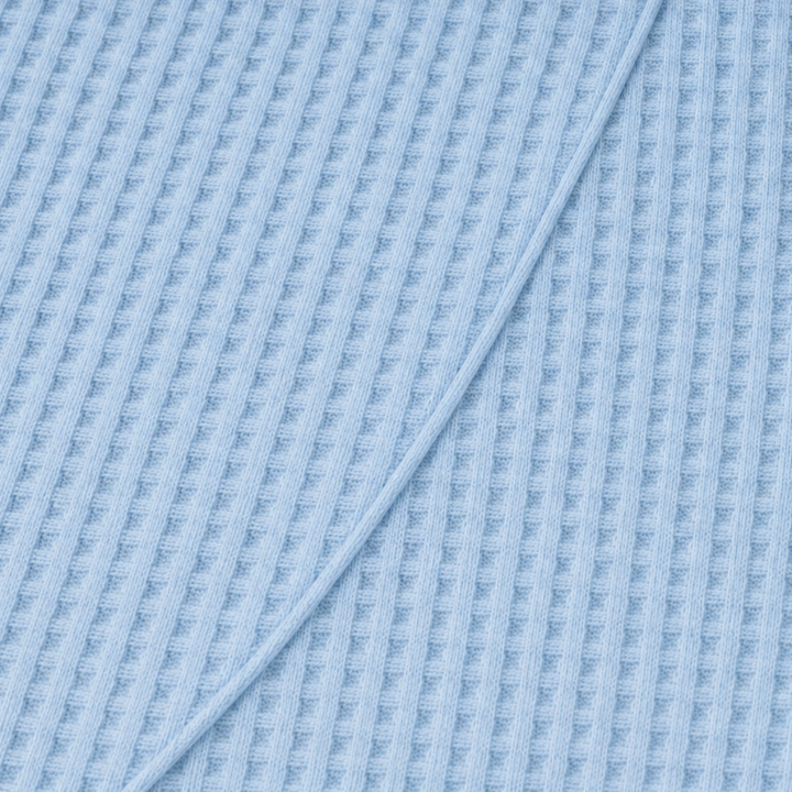 Draperly – Bluzka z asymetrycznym dołem w wyglądzie dzianiny waflowej
