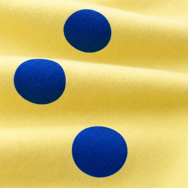 Sunbelle – Sweter z kropkami i wiązaniem na szyi