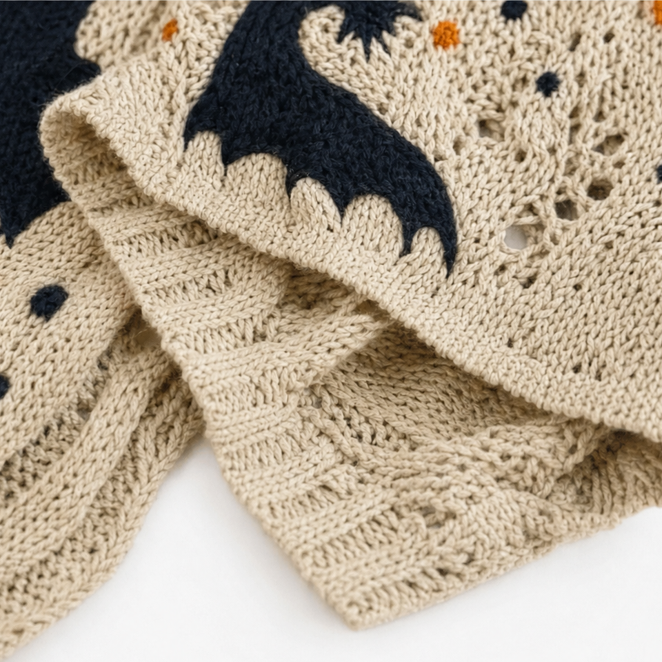 Amberknit – Sweter Dyniowy z Otworami w Szydełku