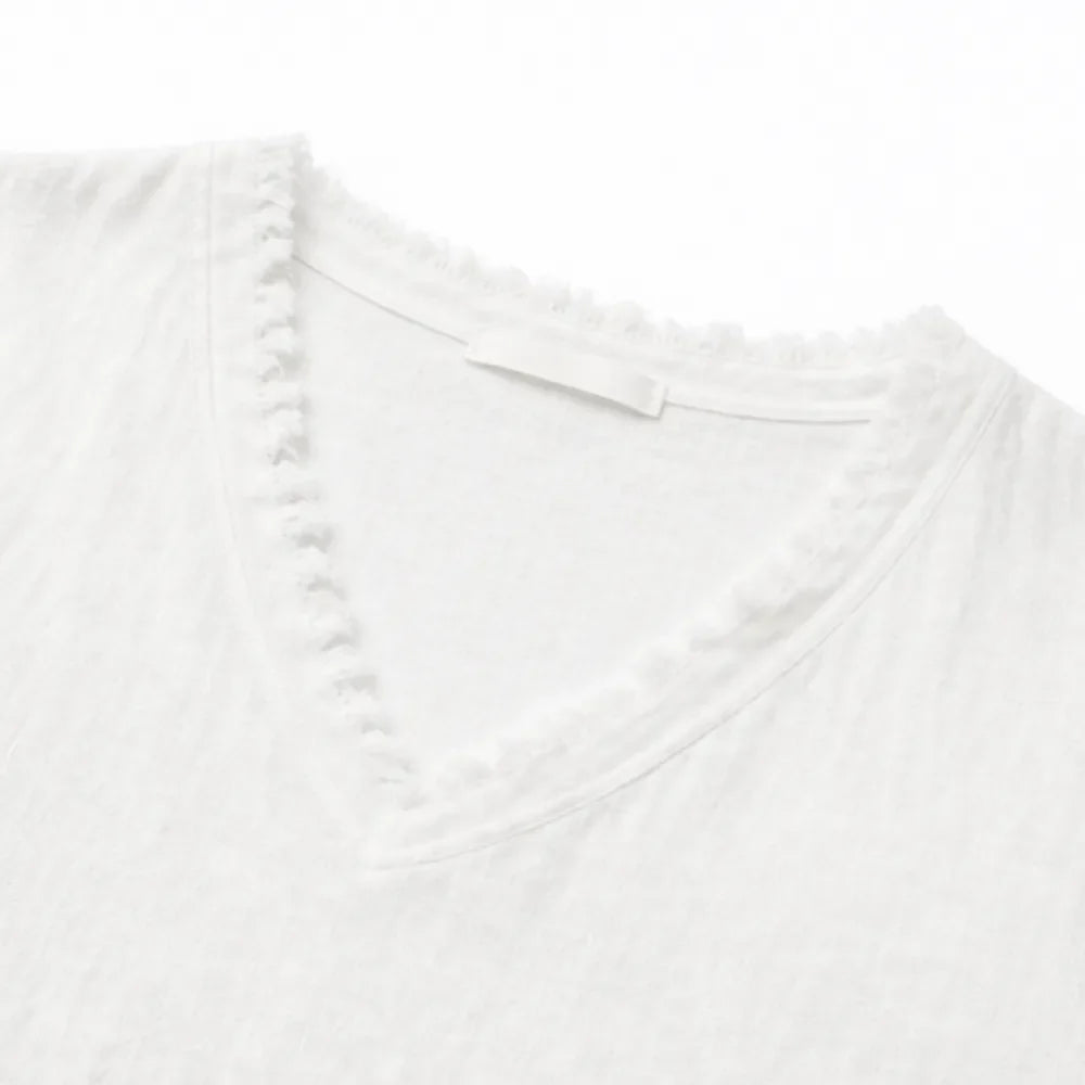 Lorelei – Boho T-shirt z frędzlami w dekolcie V dla kobiet, luźny krój maskujący brzuch