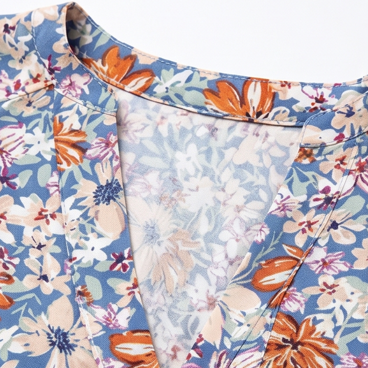 Florenza – Bluzka damska z kwiatowym nadrukiem, puff sleeves i dekoltem w serek