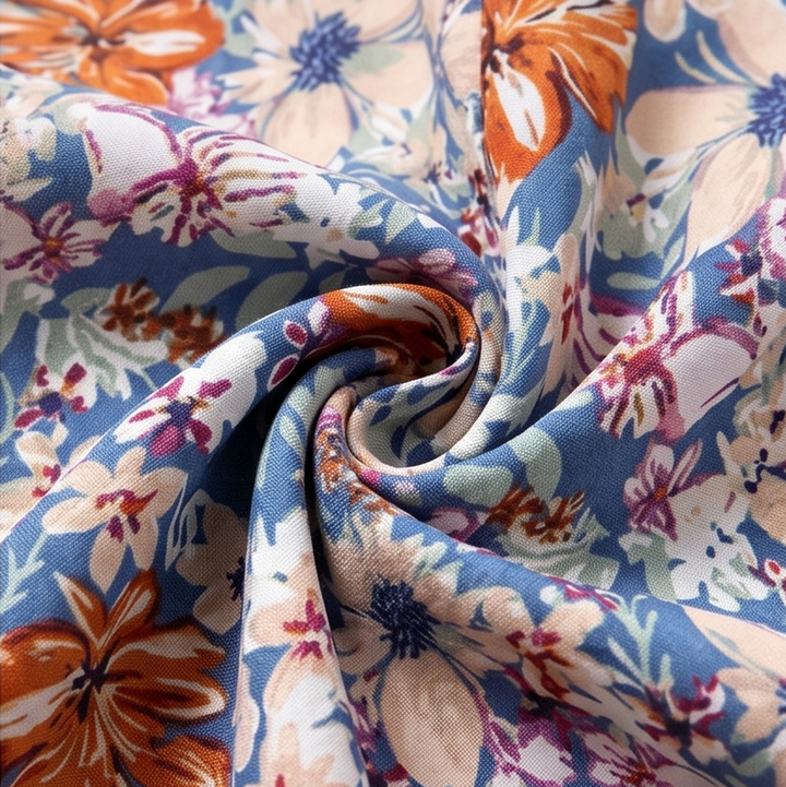 Florenza – Bluzka damska z kwiatowym nadrukiem, puff sleeves i dekoltem w serek