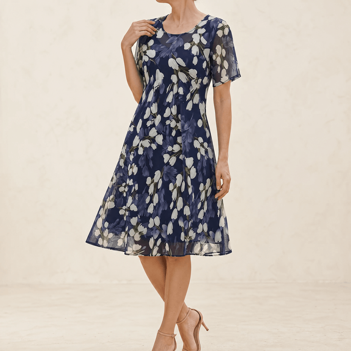 Florenza – Elegancka granatowa sukienka midi w kwiaty dla kobiet