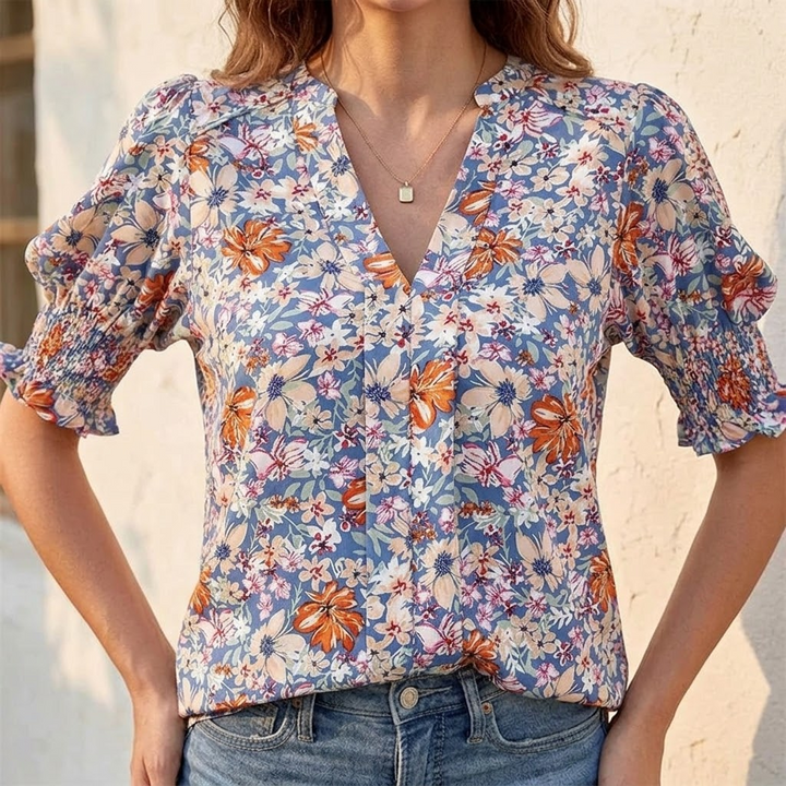 Florenza – Bluzka damska z kwiatowym nadrukiem, puff sleeves i dekoltem w serek