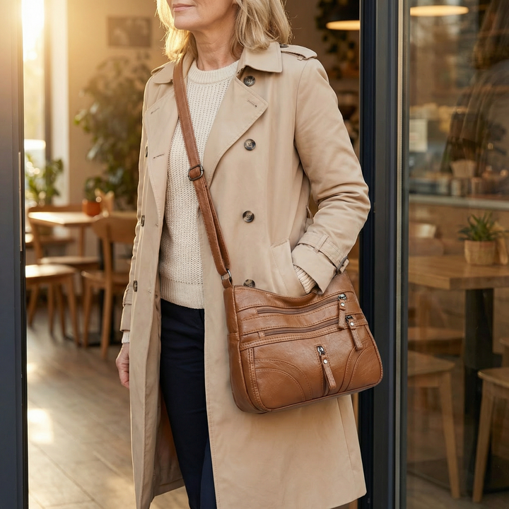Caressa – Miękka skórzana torebka crossbody z wieloma kieszeniami