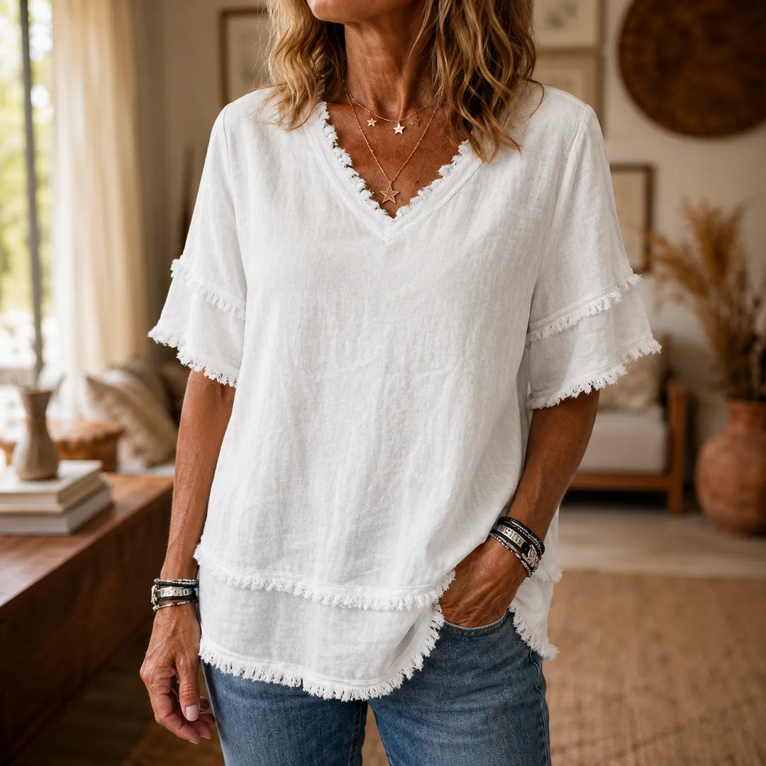 Lorelei – Boho T-shirt z frędzlami w dekolcie V dla kobiet, luźny krój maskujący brzuch