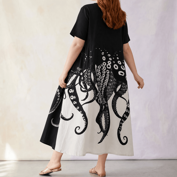 Luna – Midi sukienka w rozmiarze plus-size z artystycznym nadrukiem