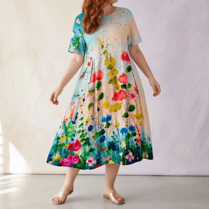 Luna – Midi sukienka w rozmiarze plus-size z artystycznym nadrukiem