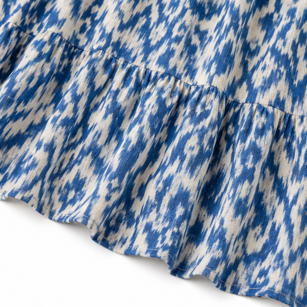 Solara – Boho Maxi Dress z Wzorem Ikat i Frędzlami przy Dekolcie w Kształcie V