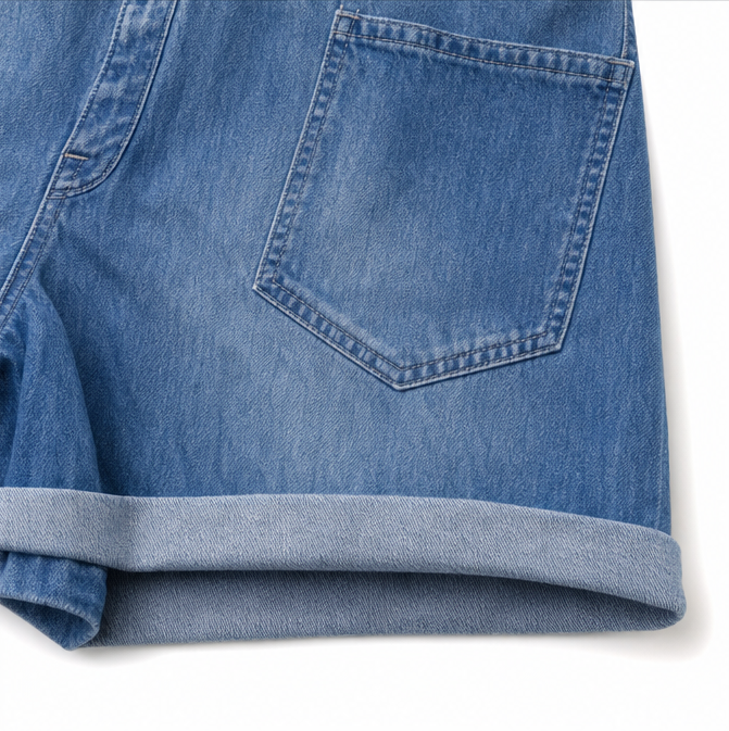 Solenna – Miękki kombinezon z denimu z guzikami z przodu i kieszeniami
