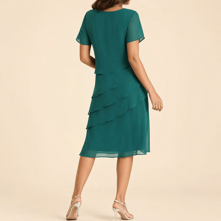 Velara – Elegancka sukienka midi z falbaną dla kobiet